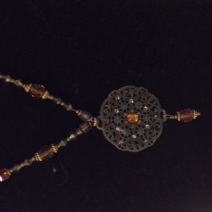 Antique brass pendant with swarovski crystals